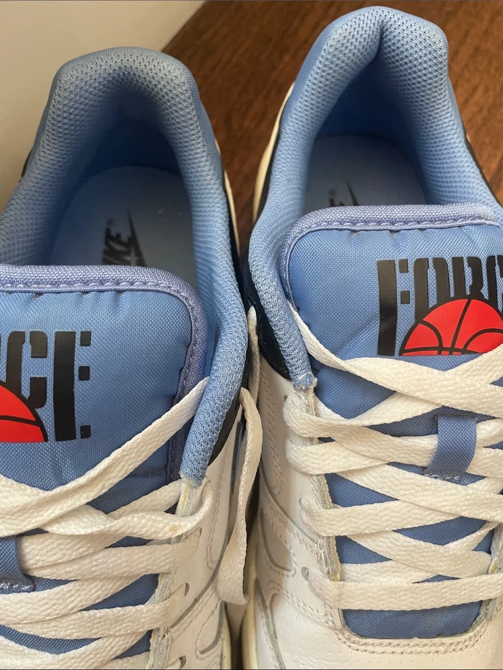 Nike White and Light Blue Low-Top Sneakers with Red Logo